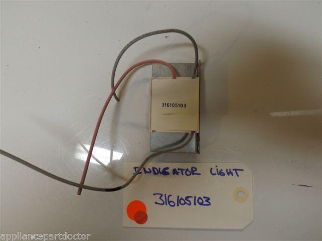 FRIGIDAIRE STOVE 316105103 INDICATOR LIGHT W/BRACKET USED FRIGIDAIRE STOVE 316105103 INDICATOR LIGHT W/BRACKET USED